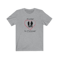 Foster to Forever - Image of grey t-shirt with an image of  a black silhouette of a woman standing next to a man with a dog sitting between them surrounded by a red line drawn heart.  The word Foster is above the image and the words to Forever are under the image. 