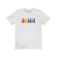 Friends are the Family we Choose Unisex Jersey Tee  - Image Description - White t-shirt with Friends written in the middle of 7 sitting dogs in rainbow colors, with are the family we choose in white under the 7 dogs.